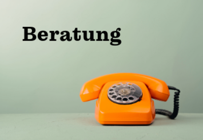Foto: oranges Telefon mit Wählscheibe und Schriftzug: Beratung
