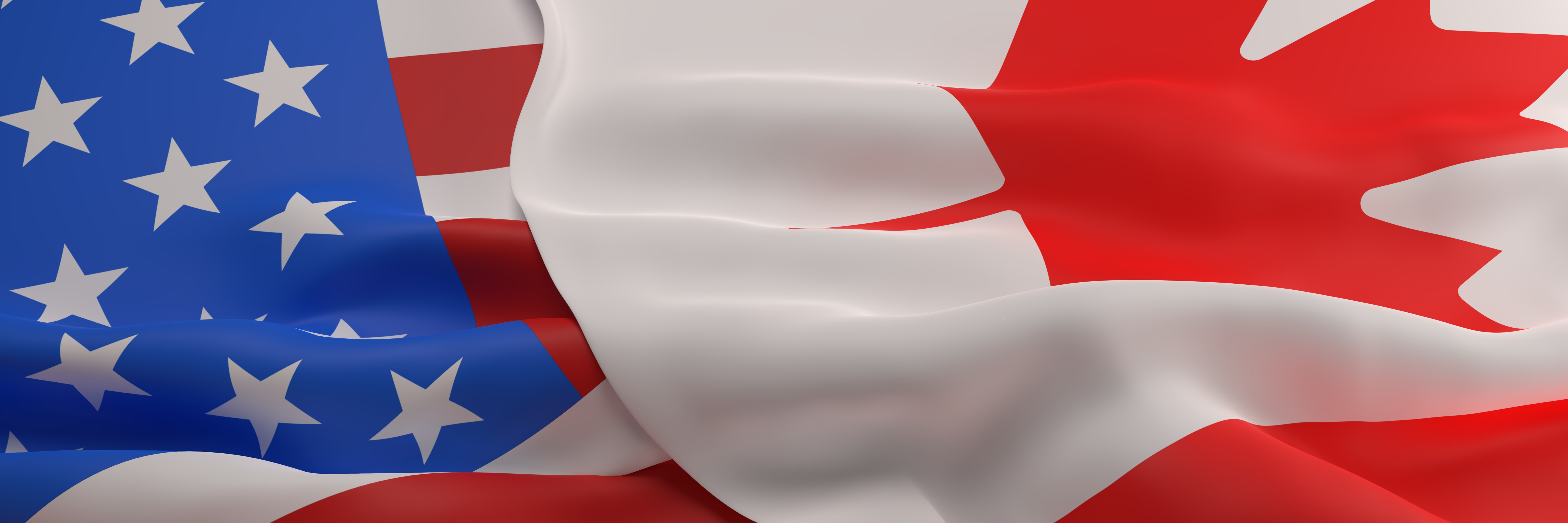 Foto: die US-amerikanische Flagge und die kanadische Flagge nebeneinander